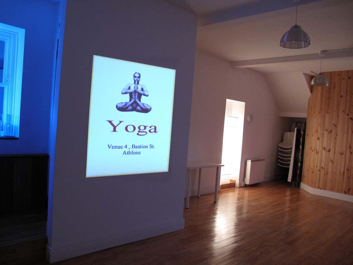 Yoga projection on a wall inside Venue 4