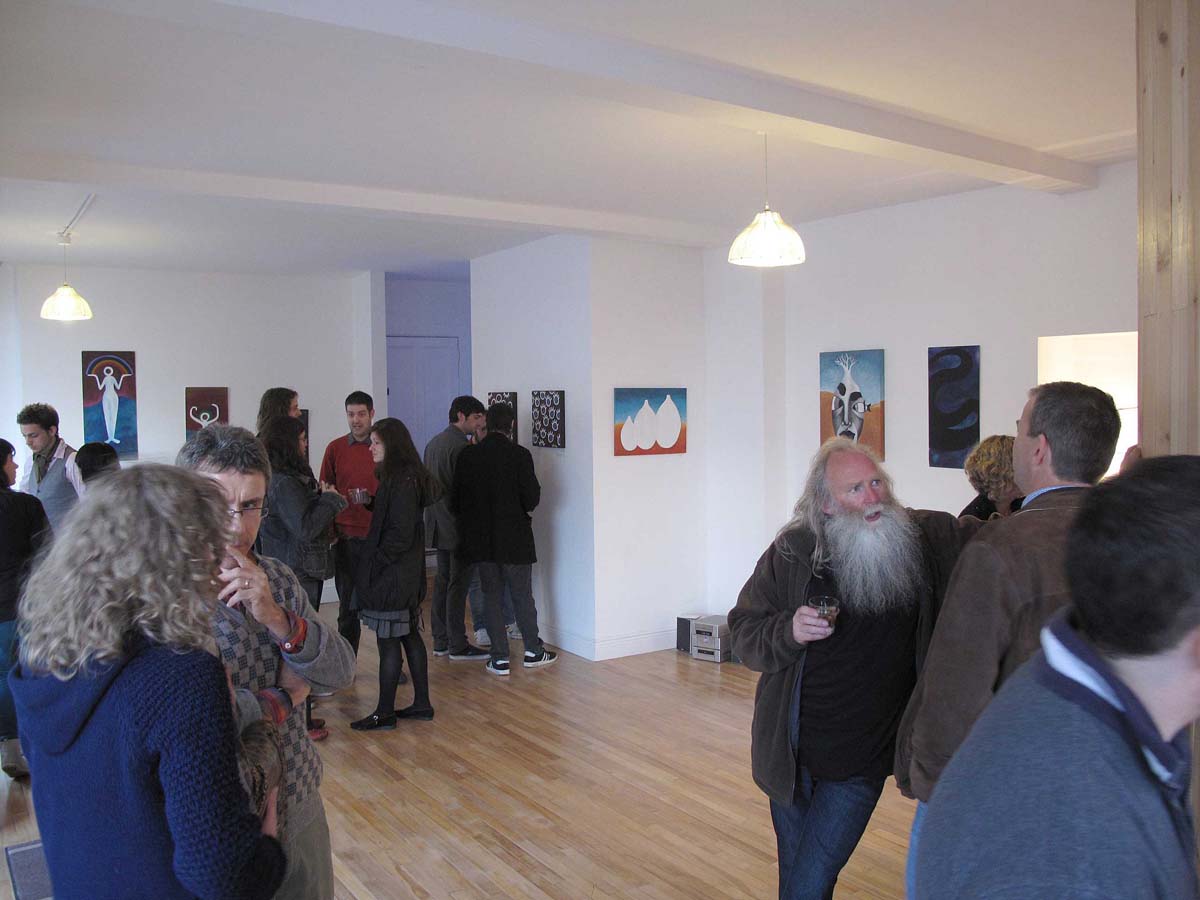 people talking in an exhibition