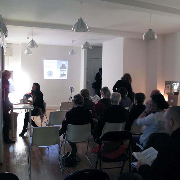 People watching a presentation inside Venue 4